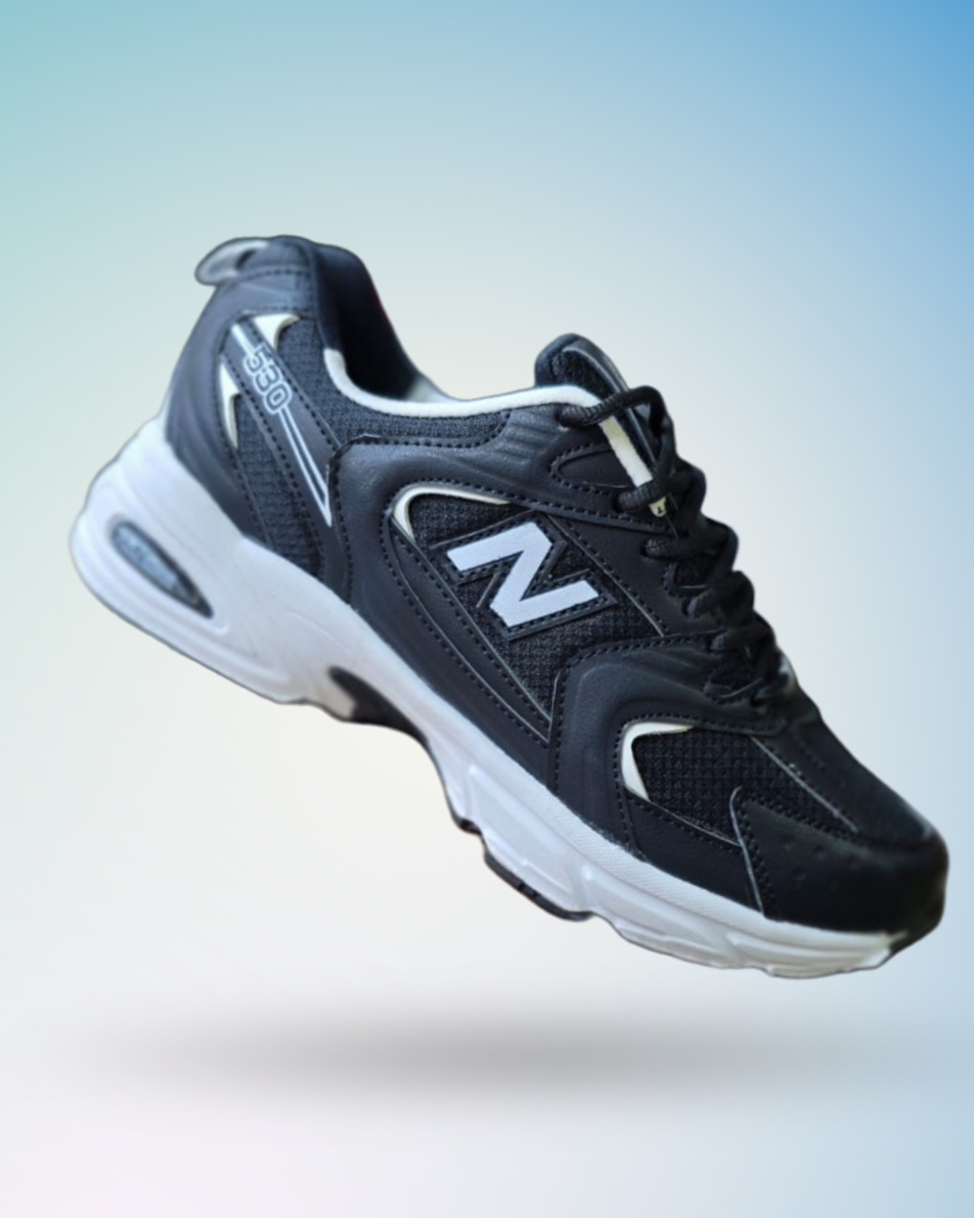 Zapatilla New Balance 530 color negro suela blanca para hombre, tallas del 39 al 43