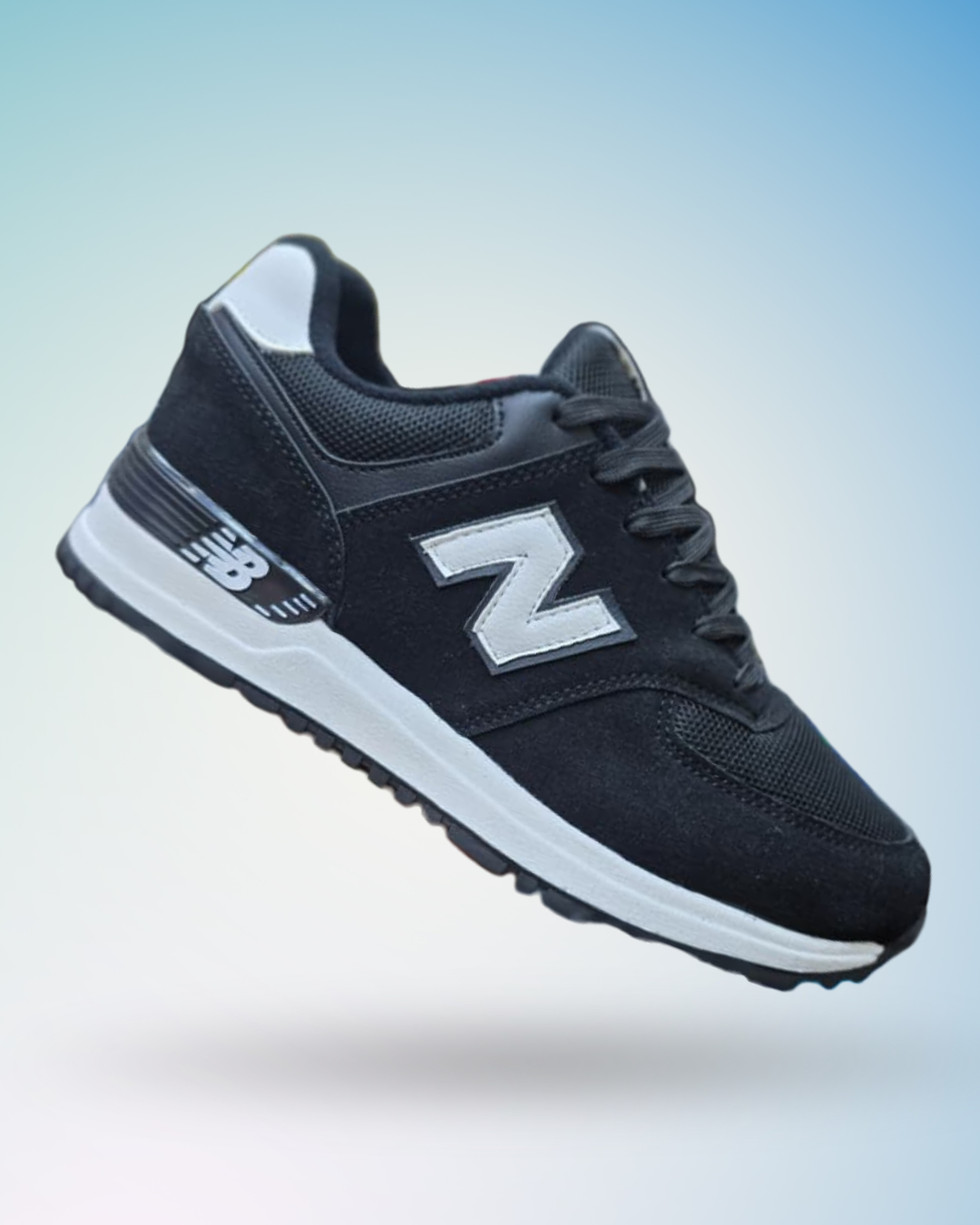 Zapatilla New Balance 574 color negro suela blanca para hombre, tallas del 39 al 43